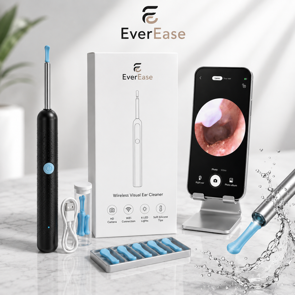 EverEase wireless visual ear cleaner set shown with the black handheld device, white retail box, smartphone displaying an endoscopic view, charging cable, small accessories, and a tray of blue ear tips on a light marble surface.
